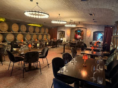 Barrel-lined dining room at The Barrel Room at Ayrburn