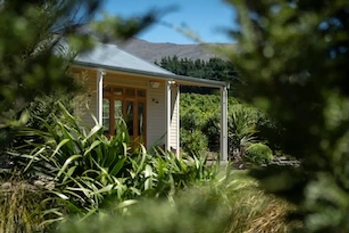 Coxs Vineyard building among gardens